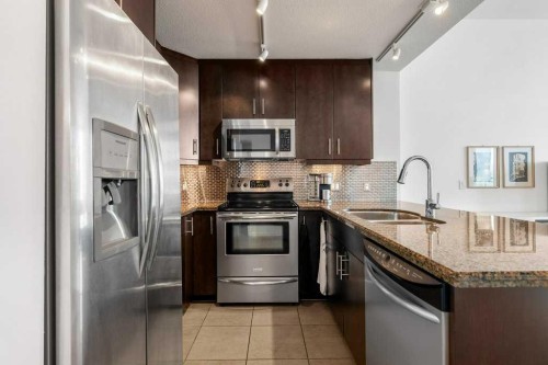 3202-210 15 Avenue Se, Calgary, AB - Indoor Photo Showing Kitchen With Stainless Steel Kitchen With Double Sink With Upgraded Kitchen