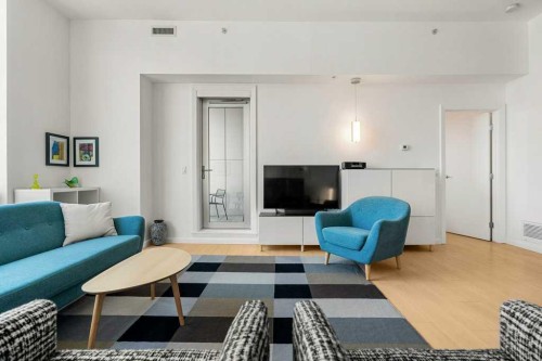 3202-210 15 Avenue Se, Calgary, AB - Indoor Photo Showing Living Room