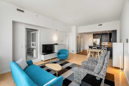 3202-210 15 Avenue Se, Calgary, AB - Indoor Photo Showing Living Room