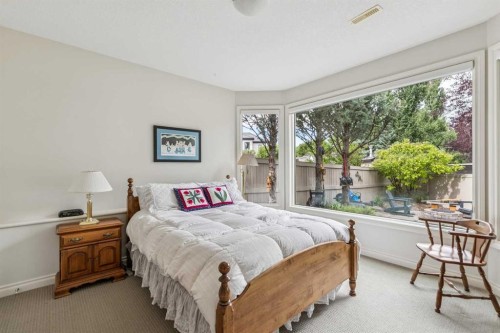 44 Evergreen Lane Sw, Calgary, AB 