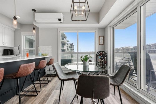 224-4150 Seton Drive Se, Calgary, AB - Indoor Photo Showing Dining Room