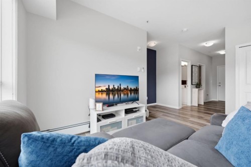 224-4150 Seton Drive Se, Calgary, AB - Indoor Photo Showing Living Room