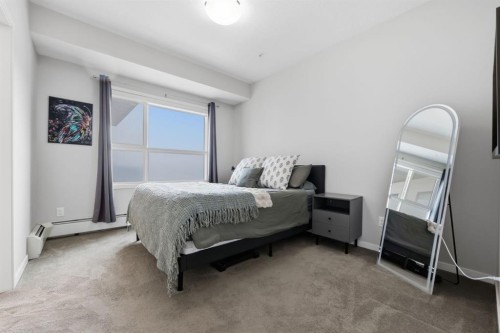 224-4150 Seton Drive Se, Calgary, AB - Indoor Photo Showing Bedroom