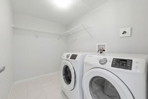 224-4150 Seton Drive Se, Calgary, AB - Indoor Photo Showing Laundry Room