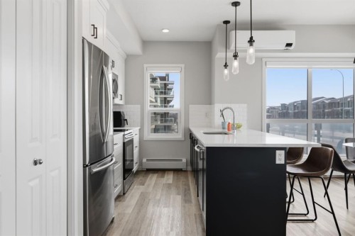 224-4150 Seton Drive Se, Calgary, AB - Indoor Photo Showing Kitchen With Upgraded Kitchen
