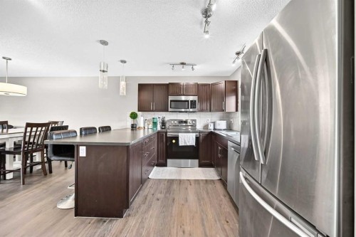 1108 Cornerstone Street Ne, Calgary, AB - Indoor Photo Showing Kitchen With Stainless Steel Kitchen With Upgraded Kitchen