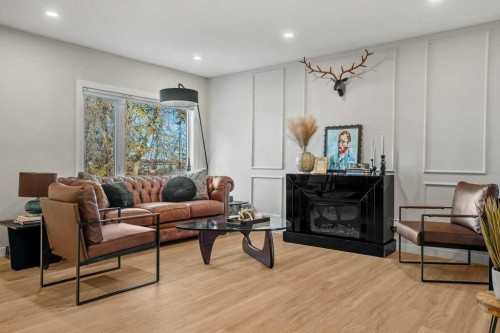 2316 State Road Sw, Calgary, AB - Indoor Photo Showing Living Room With Fireplace
