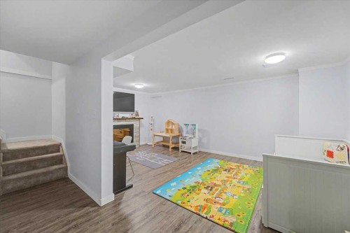 114-210 86 Avenue Se, Calgary, AB - Indoor With Fireplace