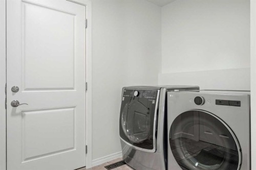 235 Arbour Stone Place Nw, Calgary, AB - Indoor Photo Showing Laundry Room