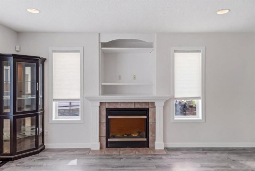 235 Arbour Stone Place Nw, Calgary, AB - Indoor With Fireplace