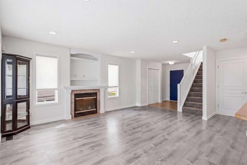 235 Arbour Stone Place Nw, Calgary, AB - Indoor Photo Showing Living Room With Fireplace