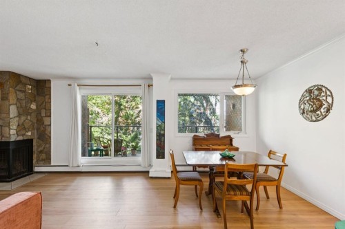 404-354 2 Avenue Ne, Calgary, AB - Indoor With Fireplace