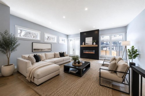 1415 27 Street Sw, Calgary, AB - Indoor Photo Showing Living Room With Fireplace