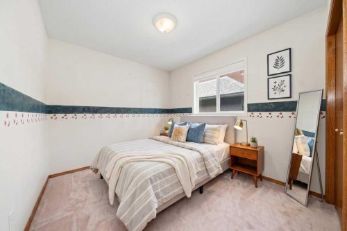 165 Douglasview Rise Se, Calgary, AB - Indoor Photo Showing Bedroom