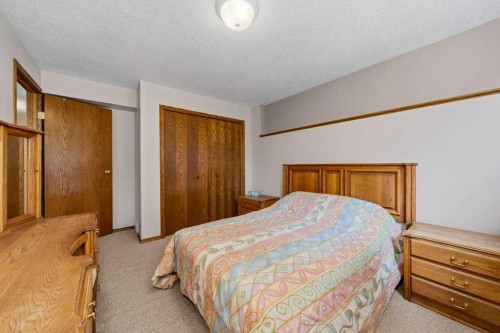 165 Douglasview Rise Se, Calgary, AB - Indoor Photo Showing Bedroom