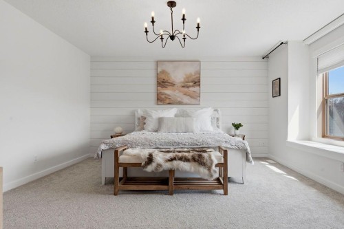708 Coopers Square Sw, Airdrie, AB - Indoor Photo Showing Bedroom