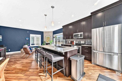 3-309 15 Avenue Ne, Calgary, AB - Indoor Photo Showing Kitchen With Upgraded Kitchen