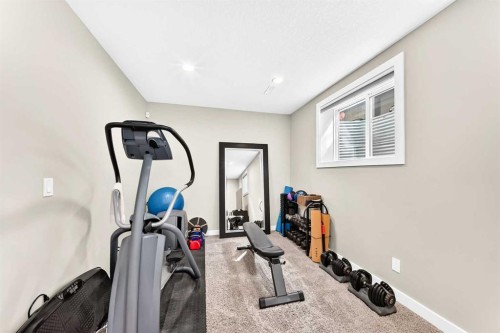 3-309 15 Avenue Ne, Calgary, AB - Indoor Photo Showing Gym Room