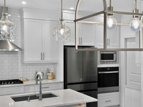 97 Rowmont Heath Nw, Calgary, AB - Indoor Photo Showing Kitchen With Upgraded Kitchen