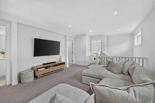 97 Rowmont Heath Nw, Calgary, AB - Indoor Photo Showing Living Room
