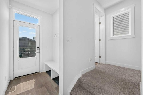 97 Rowmont Heath Nw, Calgary, AB - Indoor Photo Showing Other Room