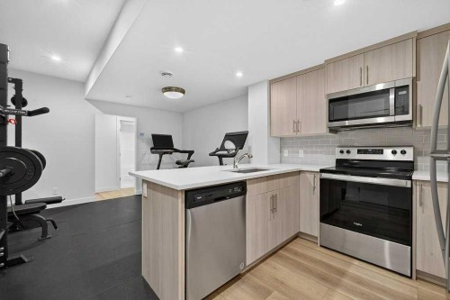 97 Rowmont Heath Nw, Calgary, AB - Indoor Photo Showing Kitchen