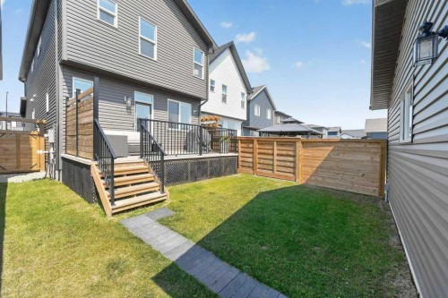 97 Rowmont Heath Nw, Calgary, AB - Outdoor With Deck Patio Veranda