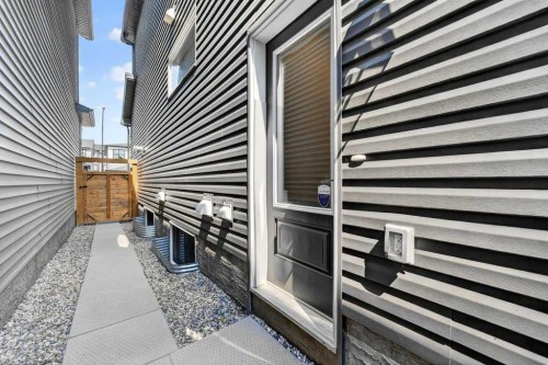 97 Rowmont Heath Nw, Calgary, AB - Outdoor With Exterior