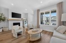 97 Rowmont Heath Nw, Calgary, AB  - Indoor Photo Showing Living Room 