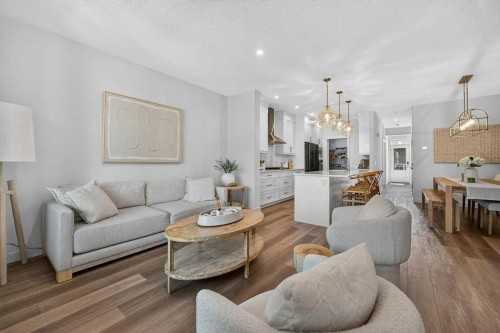 97 Rowmont Heath Nw, Calgary, AB - Indoor Photo Showing Living Room