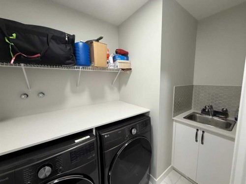 113 Corner Glen Way Ne, Calgary, AB - Indoor Photo Showing Laundry Room