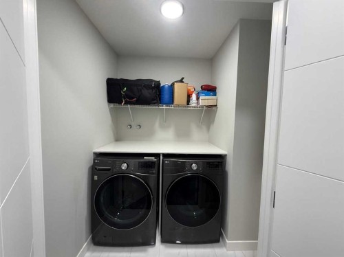 113 Corner Glen Way Ne, Calgary, AB - Indoor Photo Showing Laundry Room