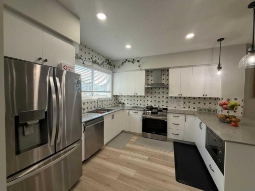 113 Corner Glen Way Ne, Calgary, AB - Indoor Photo Showing Kitchen With Double Sink With Upgraded Kitchen