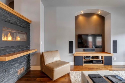 2217 8 Avenue Se, Calgary, AB - Indoor Photo Showing Living Room With Fireplace