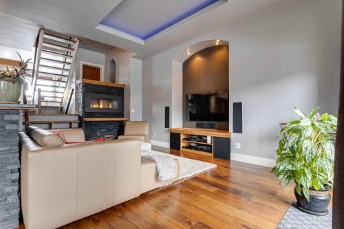 2217 8 Avenue Se, Calgary, AB - Indoor Photo Showing Living Room With Fireplace