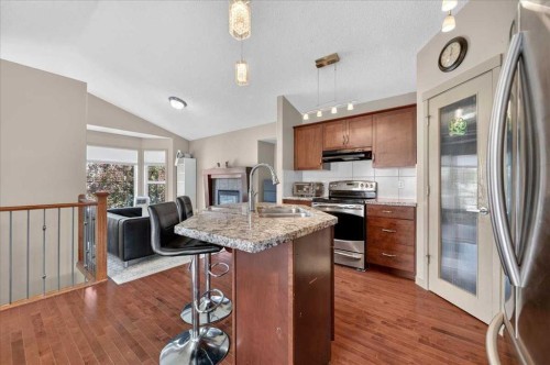139 Silverado Way Sw, Calgary, AB - Indoor Photo Showing Kitchen With Double Sink