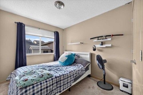 139 Silverado Way Sw, Calgary, AB - Indoor Photo Showing Bedroom