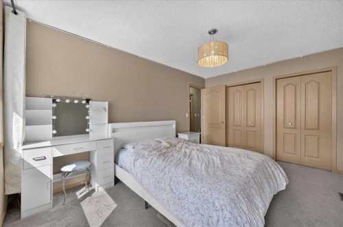 139 Silverado Way Sw, Calgary, AB - Indoor Photo Showing Bedroom