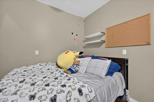 139 Silverado Way Sw, Calgary, AB - Indoor Photo Showing Bedroom