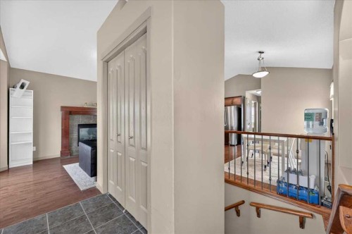 139 Silverado Way Sw, Calgary, AB - Indoor Photo Showing Other Room With Fireplace