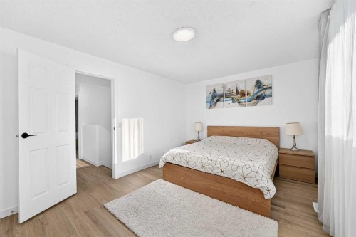 135 Woodsman Lane Sw, Calgary, AB - Indoor Photo Showing Bedroom