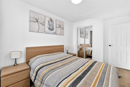 135 Woodsman Lane Sw, Calgary, AB - Indoor Photo Showing Bedroom