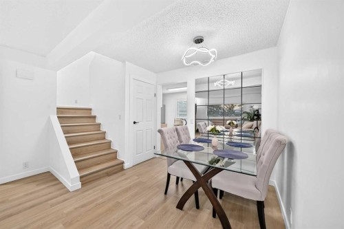 135 Woodsman Lane Sw, Calgary, AB - Indoor Photo Showing Dining Room