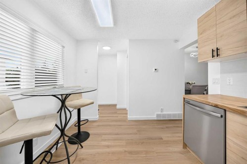 135 Woodsman Lane Sw, Calgary, AB - Indoor Photo Showing Kitchen