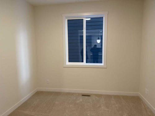 111 Sundown Crescent, Cochrane, AB - Indoor Photo Showing Other Room