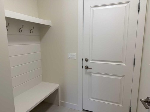 111 Sundown Crescent, Cochrane, AB - Indoor Photo Showing Laundry Room