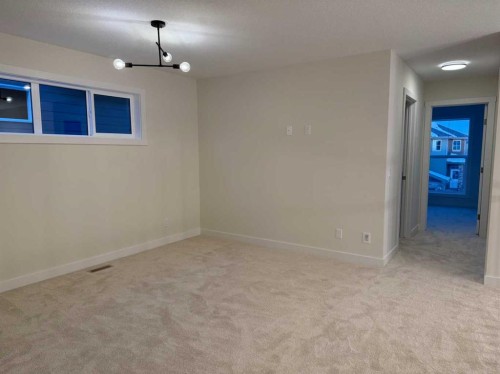 111 Sundown Crescent, Cochrane, AB - Indoor Photo Showing Other Room