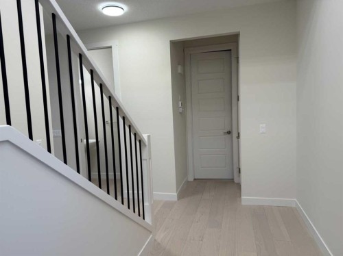 111 Sundown Crescent, Cochrane, AB - Indoor Photo Showing Other Room