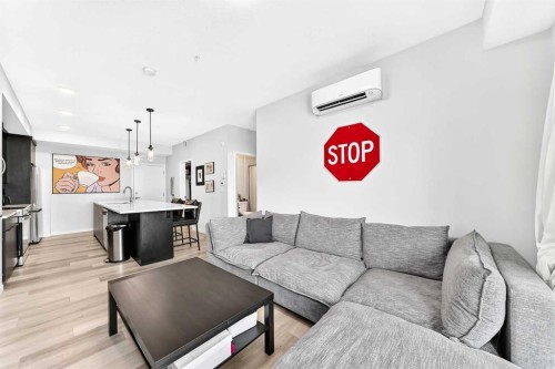 2308-220 Seton Grove Se, Calgary, AB - Indoor Photo Showing Living Room