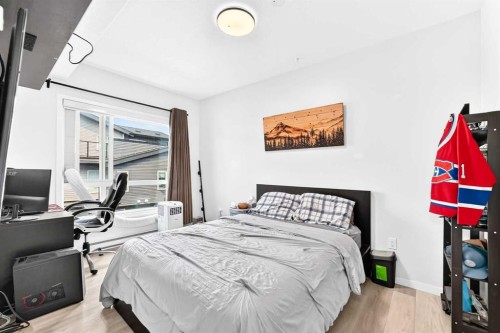 2308-220 Seton Grove Se, Calgary, AB - Indoor Photo Showing Bedroom
